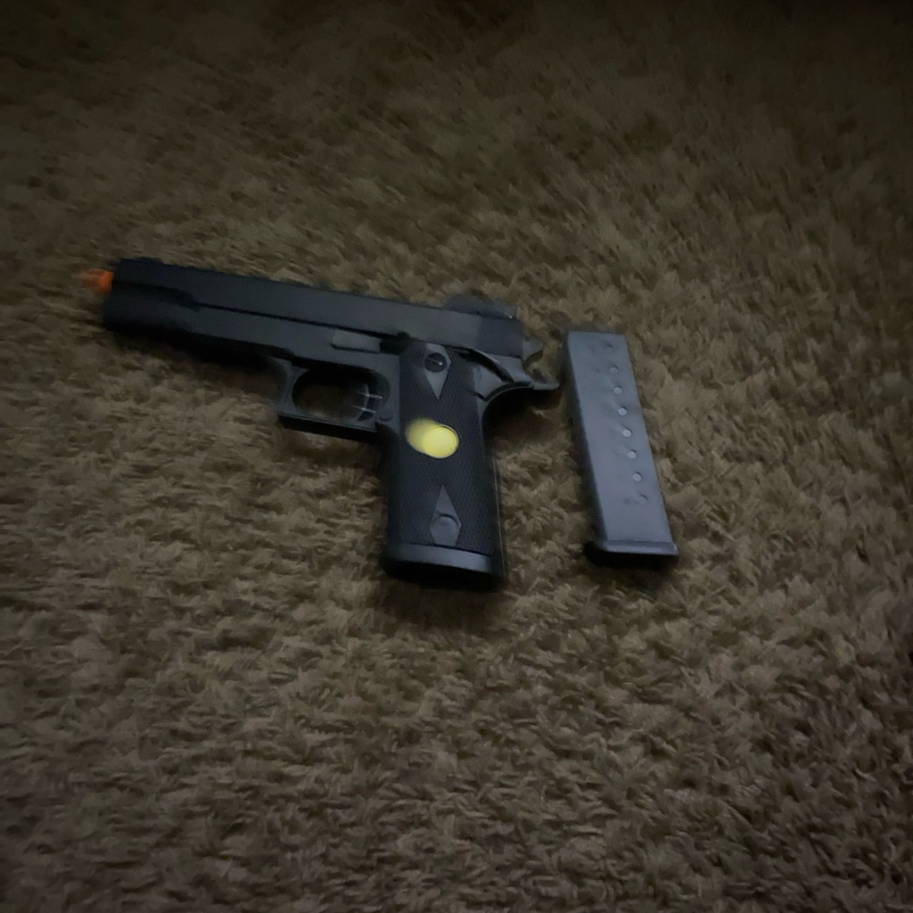 Black Airsoft Pistol With Magazine